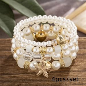 Elegant Bohemian multi-layer beaded bracelet set with white pearls and starfish charms