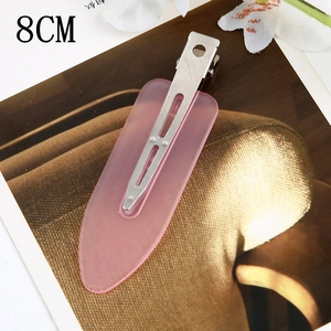 Detail shot of 8cm translucent pink acetate hair clip with seamless flat design