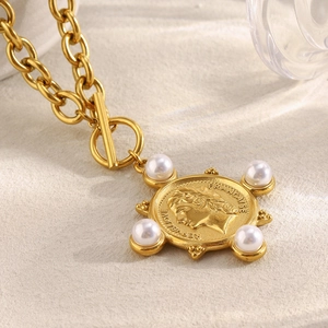 18K gold plated O-chain necklace with queen coin pendant and pearl accents featuring OT clasp