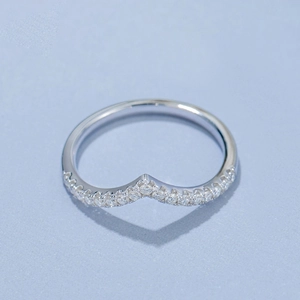 Close-up of elegant V-shaped S925 silver ring with sparkling pavé moissanite stones