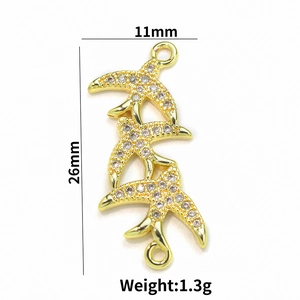 Detailed view of 18k gold plated starfish charm with zircon stones, 11x26mm size