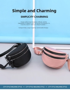 Detail showing dual zippered compartments and adjustable strap of the nylon crescent bag