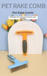 Close-up of double-row pet rake combs with non-slip handles for grooming hair knots