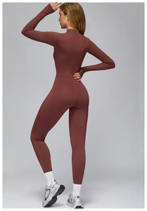 Slim fit long sleeve thermal yoga bodysuit in terracotta with seamless back contours