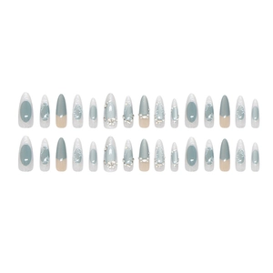 Glacier blue cat eye press-on nails with 3D floral relief and pearl rhinestones