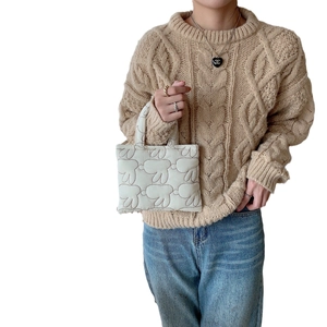 Minimalist white quilted rabbit handbag for women featuring a soft padded cloud texture