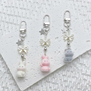 Cute plush bunny keychain set with bow and star charms in white pink and grey