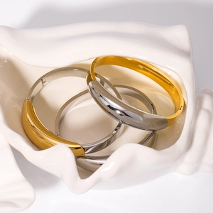 Minimalist bicolor stainless steel open cuff bracelet in 18k gold and silver finish