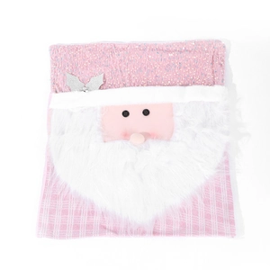 Detail of pink Christmas chair cover featuring Santa Claus face and white faux fur beard