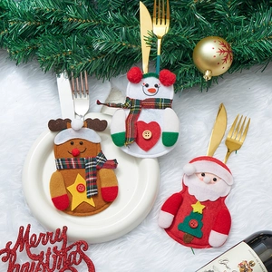 Weihnachtliche Besteckhalter mit Weihnachtsmann, Schneemann und Rentier aus Filz
