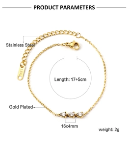 Detail of 18K gold plated stainless steel bracelet with three teardrop-shaped zircons