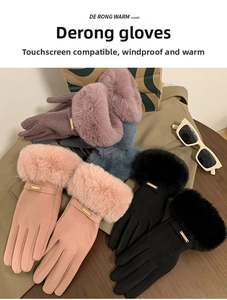 Detail of warm winter gloves with plush fur cuffs and touchscreen fingertips in multiple colors