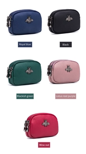 Three-zipper leather coin purses in various colors featuring vintage bee decorative details