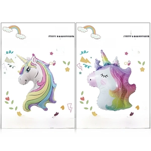 Rainbow and starry unicorn foil balloons set on display card for party decoration