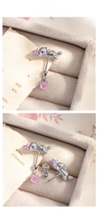 Detailed view of cat-shaped stud earrings with pink heart zircon and screw-back posts