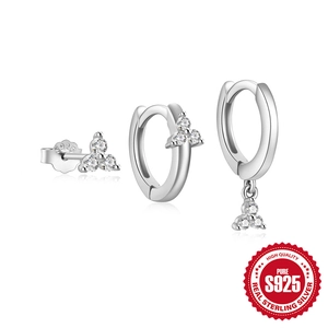 Classic S925 sterling silver hoop earrings set with triple zircon clusters on white background