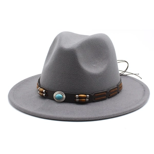 Close-up of dark grey wide brim fedora with ethnic turquoise and bead band detail