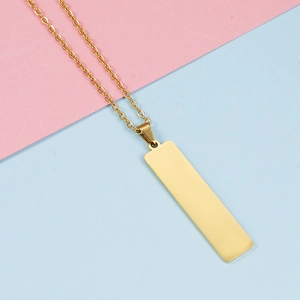 Polished gold rectangular bar pendant necklace on minimalist link chain with bright finish