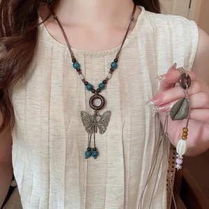 Vintage Ethnic Bohemian Long Sweater Chain Necklace With Alloy Hollow Butterfly Pendant Wood And Ceramic Beads