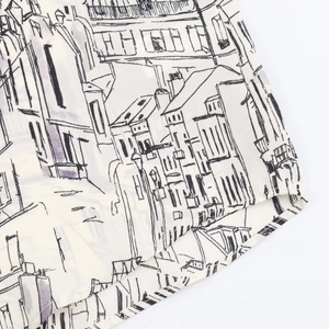 Macro detail of casual shirt hem with architectural print and high-quality stitching