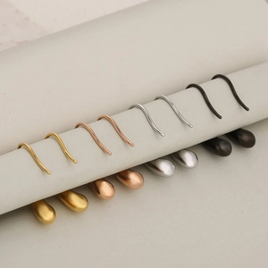 French vintage teardrop earrings in gold, silver, rose gold, and matte black stainless steel