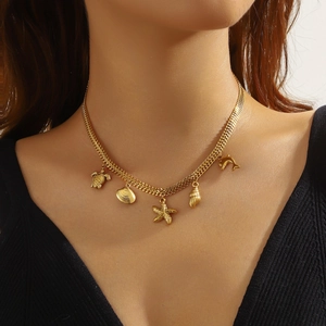 Gold plated stainless steel woven chain necklace with sea turtle and shell pendants