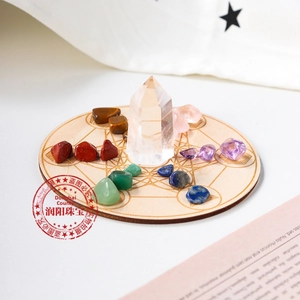 Macro detail of natural healing crystal set on wooden Metatron's Cube altar plate