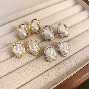 Baroque style irregular pearl earrings set with gold and silver metal frames for women