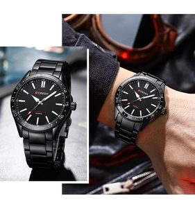 Macro shot of CURREN black steel watch band and dial details with water resistant logo