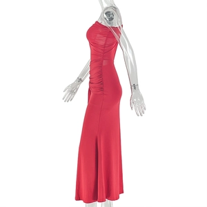 Detail showing side ruched folds on a slim-fit red off-shoulder long dress for women