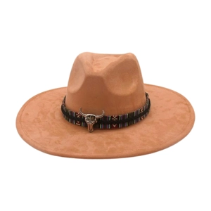 Detailed view of the bull head charm and ethnic band on the tan wide-brim fedora.