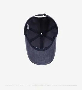 Detailed interior of navy baseball cap with reinforced stitching and adjustable metal buckle
