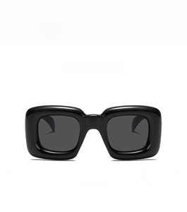 Vue de face des lunettes de soleil carrées à monture épaisse pour enfants en noir