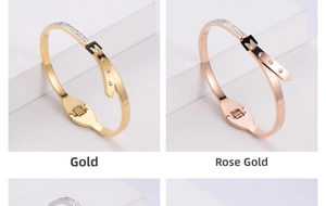 Detailed view of buckle design bangle with inlaid zircons in gold and rose gold