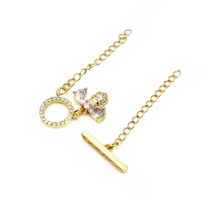 Detail of gold-plated bee toggle clasp with cubic zirconia for DIY jewelry making