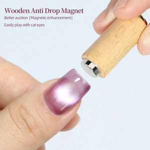 Strong cylindrical wood handle magnet tool for creating cat eye nail art effects