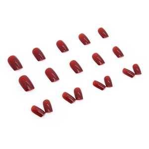 Glossy burgundy square-oval press-on nails with jelly-like translucent finish on white