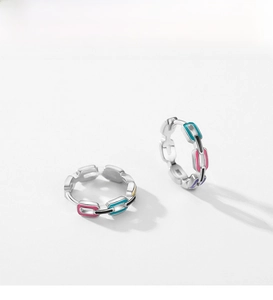 Detail of S925 sterling silver hoop earrings with vibrant colorful enamel chain links