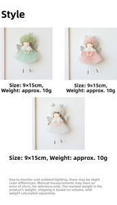 Close-up of three plush angel dolls in green, pink, and white with silver reindeer antlers