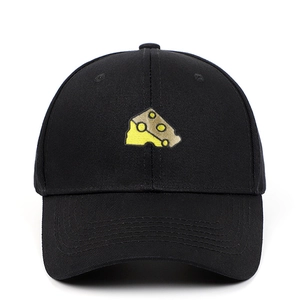 Classic black cotton baseball cap with yellow cheese embroidery on white background