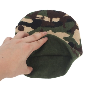 Winter camouflage knit beanie with warm dark green lining for outdoor insulation