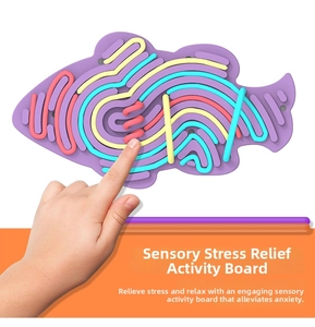Fish-shaped sensory board with colorful silicone strings for fine motor skill practice