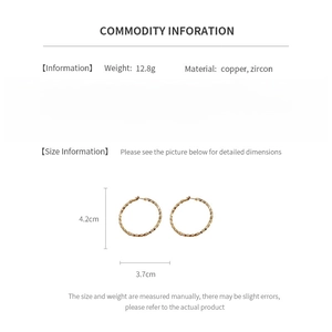 Detailed spec sheet showing weight 12.8g and dimensions 4.2cm of golden zircon earrings