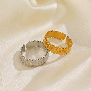 Adjustable geometric stainless steel rings in gold and silver with unique bubble texture