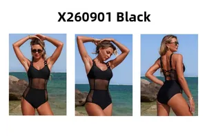 Detail view of black one-piece swimsuit with mesh panels and metal ring straps