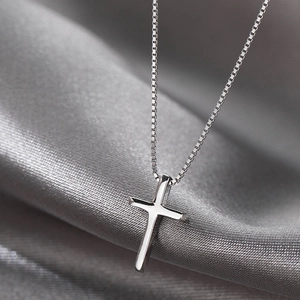 Minimalist silver cross pendant necklace with polished box chain for women