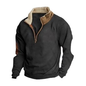 Detail of men's half-zip sweatshirt featuring faux leather elbow patches and fleece lining