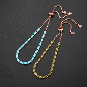 Adjustable rose gold bolo bracelets with rectangular turquoise and peridot zircons