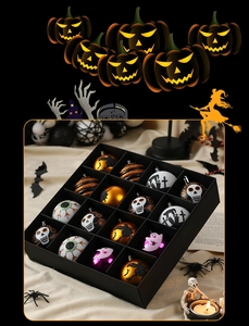 Detail view of 16-piece Halloween decorative ball set in a black gift box with festive patterns