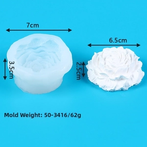 Macro shot of 3D peony silicone mold and finished plaster flower with layered petals